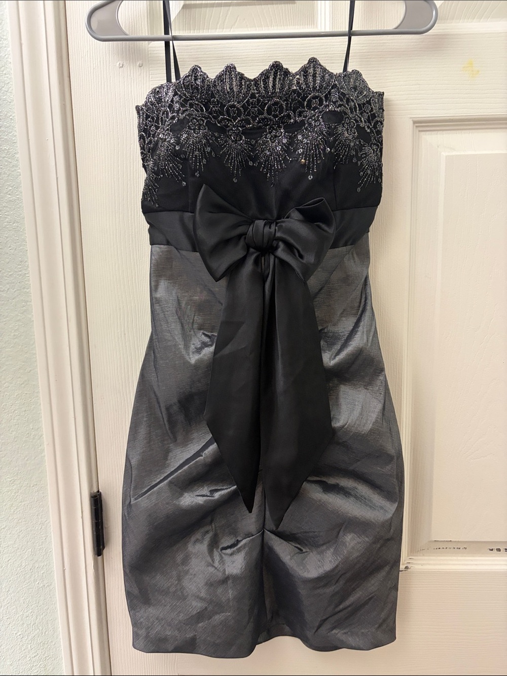 Blondie Nites Black and Silver Strapless Party Dress with Bow Accent